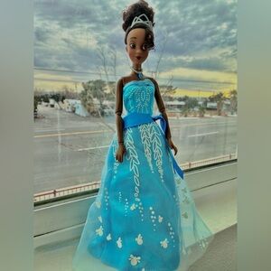 Preowned Disney Princess Tiana Doll in Blue Dress (*Dress Plays Music/Lights Up)